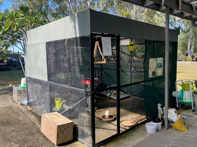 Club members presting birds to aged care residents